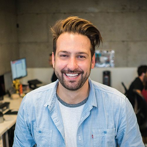 Smiling young professional in the office